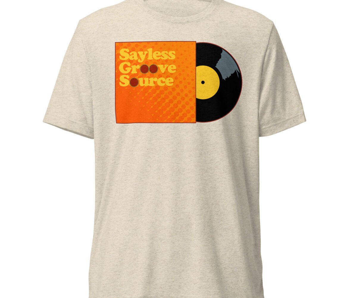 "Say Less" front view oatmeal colored t-shirt with album cover and record graphic.